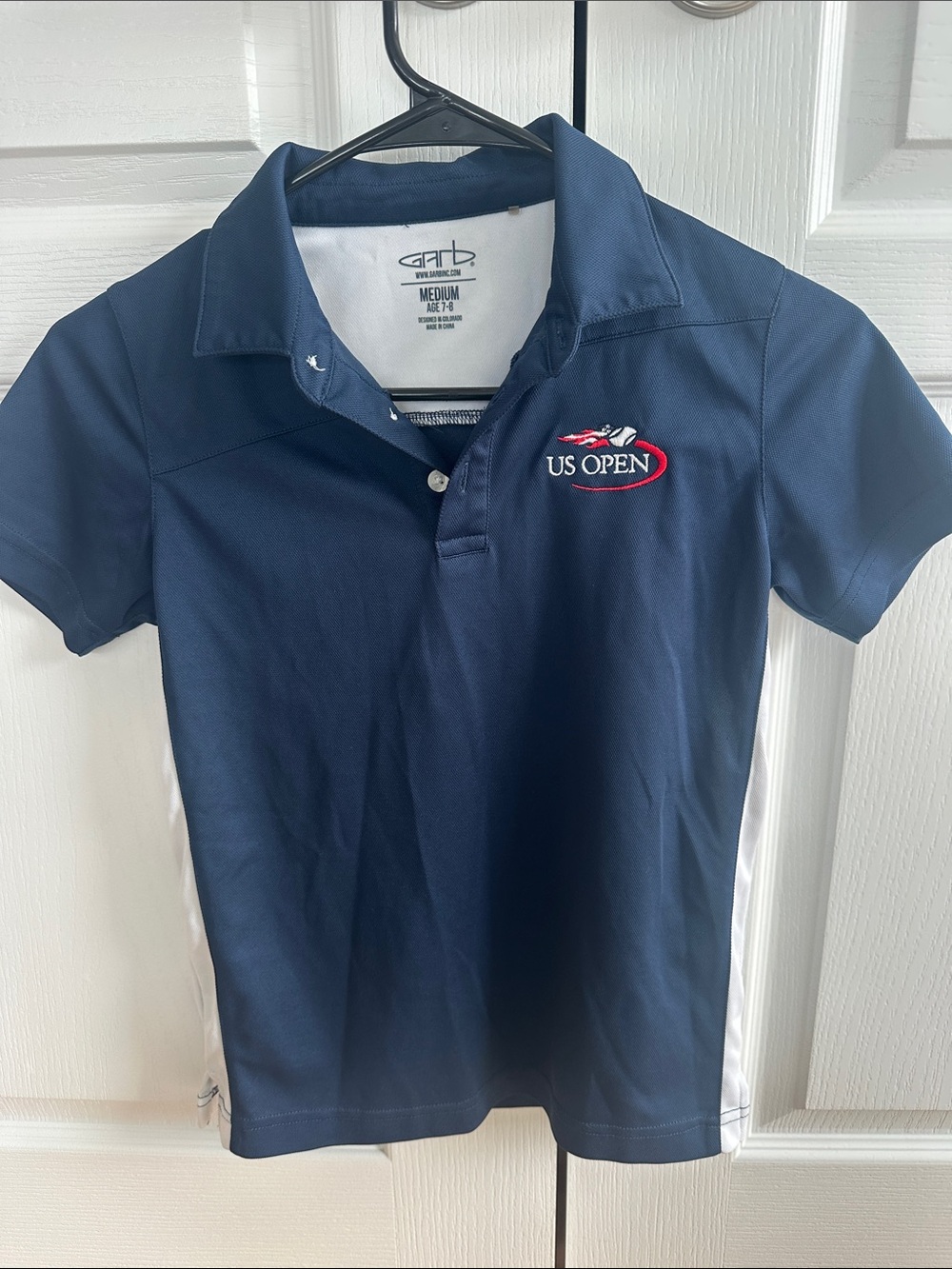 US Open Navy Kids' Polo Shirt by Garb